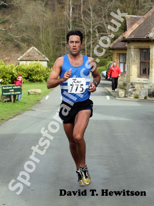 Michael Morris (Morpeth Harriers) wins the 2012 Run Northumberland 10k Road Race, Cragside, Rothbury, Northumberland.